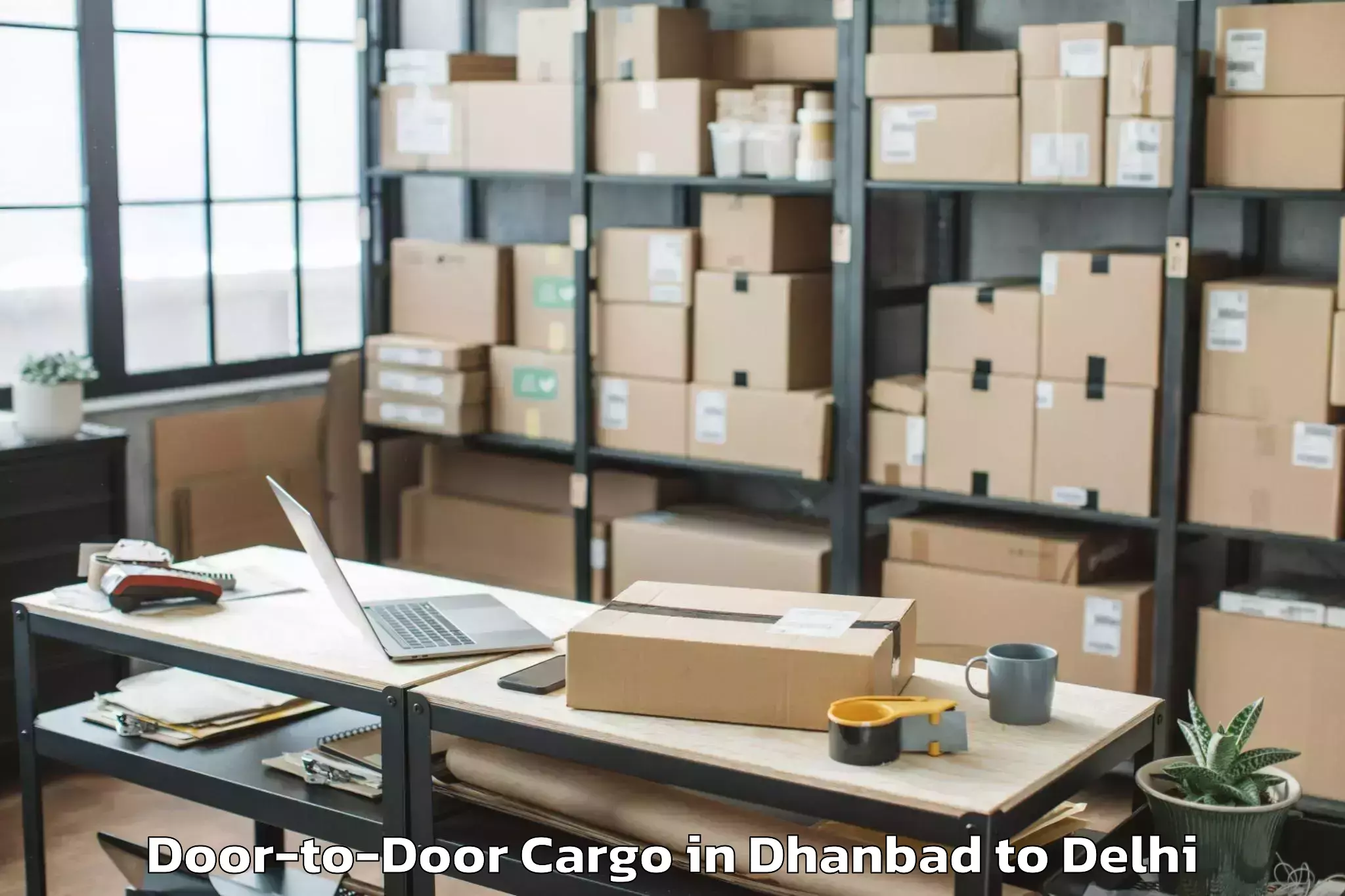 Leading Dhanbad to Pitampura Door To Door Cargo Provider